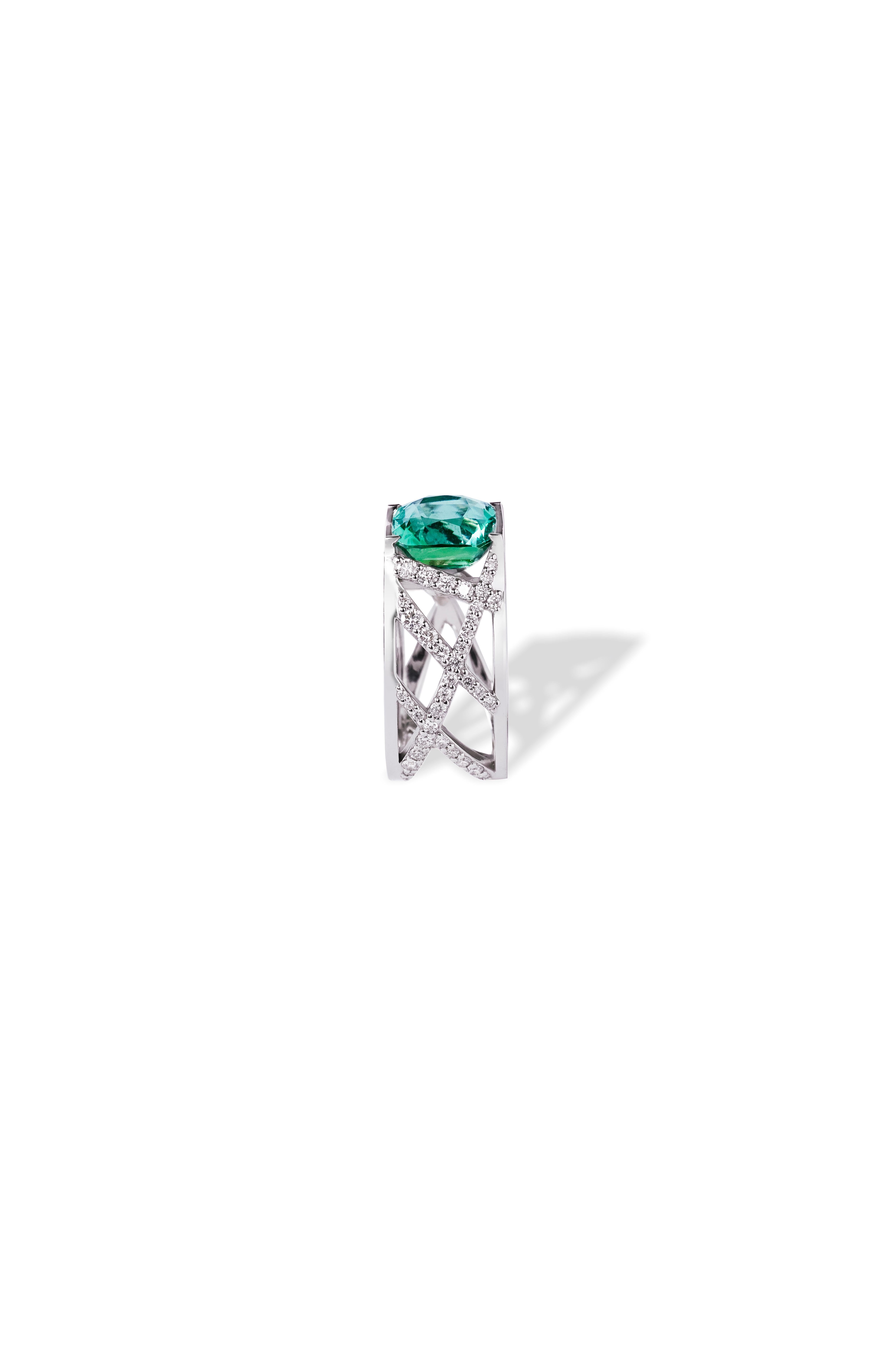 This ring is made to order only. Completely customizable. Ring handcrafted in 18W gold 5.0g., handset White Diamonds 0.87 ct., Mint Tourmaline 4.05 ct. (stone size 9.25x9.25x6.87mm). 

Gemstones are natural and not treated. 

Tod’s Omotesando
