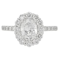 18K White Gold Ring with 0.78cts Oval Center Stone and 0.85cts Round Diamonds