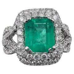 18k White Gold Ring with 1.92Ct. Emerald and Diamonds 1.34 Ct. (Size 5.75)