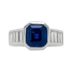 18k White Gold Ring with 3.31 Ct Asscher Cut Sapphire & 1.15 Ct Emerald Diamonds