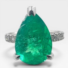 18k White Gold Ring with 3.36 Ct. Emerald and Diamonds 0.98 Ct. (Size 6.75)