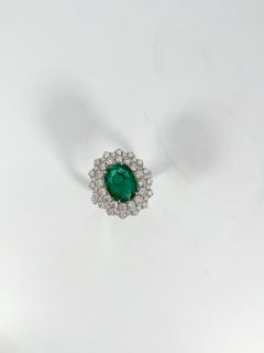 18K White Gold Ring with 3.93 CT Emerald and 1.84 CTW Diamonds