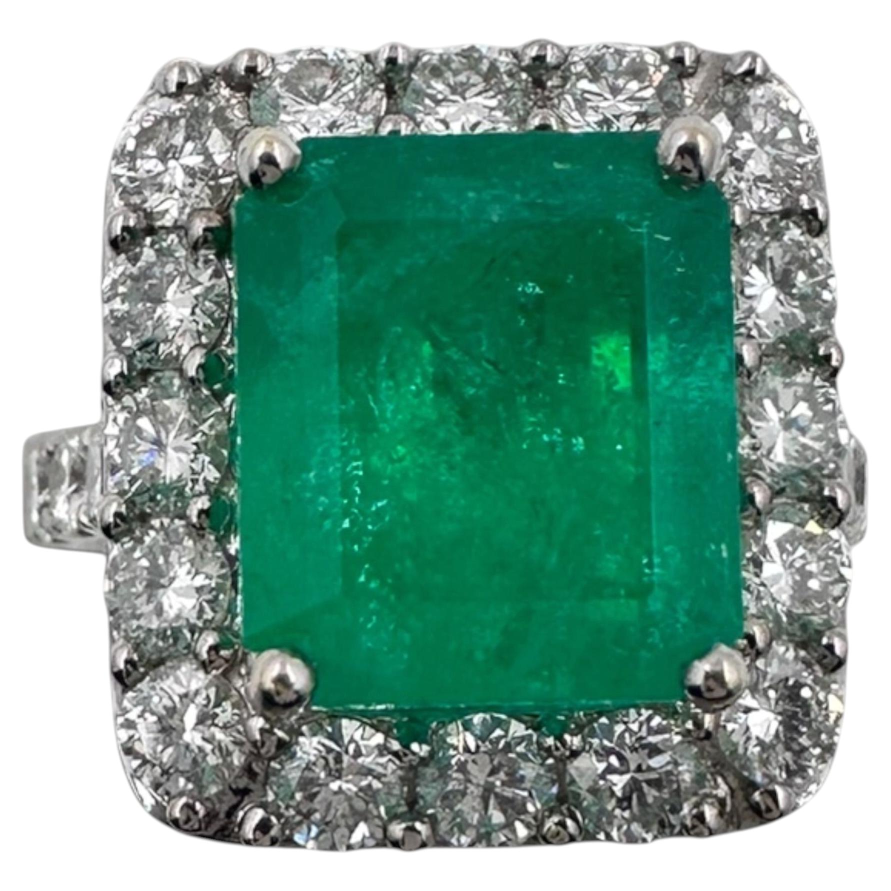 18k White Gold Ring with 4.63Ct. Emerald and Diamonds 1.91 Ct. (Size 6.25)