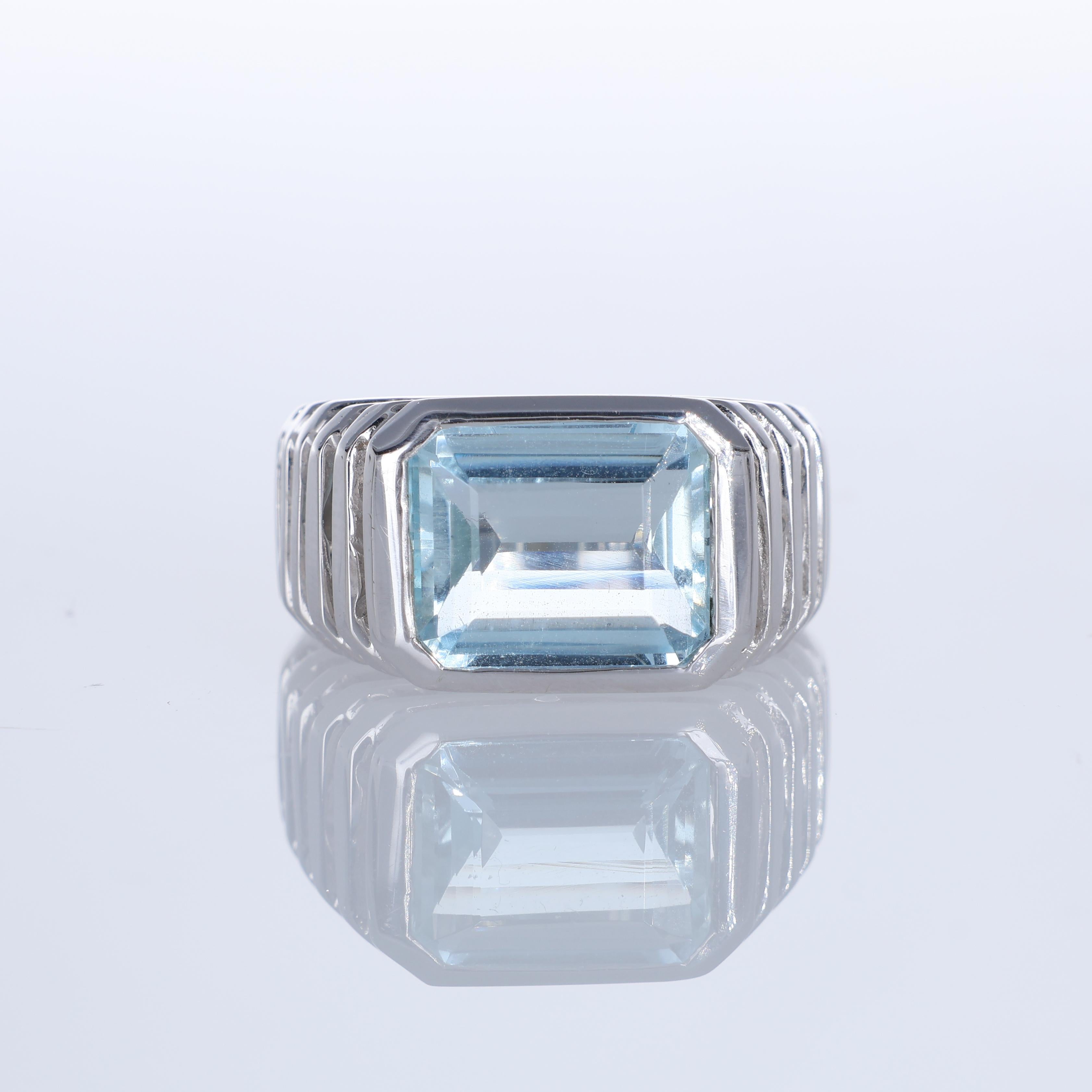 IMPORTANT NOTE:
✔ No additional costs will be added to this order.
✔ Shipping and customs duties are fully covered by us.
--------------------
A striking 18K white gold ring showcasing a 4.98-carat emerald-cut aquamarine. The bold step-cut design