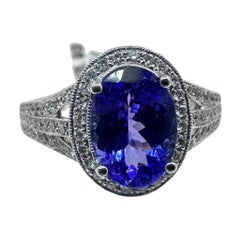 Bague en or blanc 18K avec 5.00Ct. Tanzanite et diamants 0,70 ct. (Taille 6.50)
