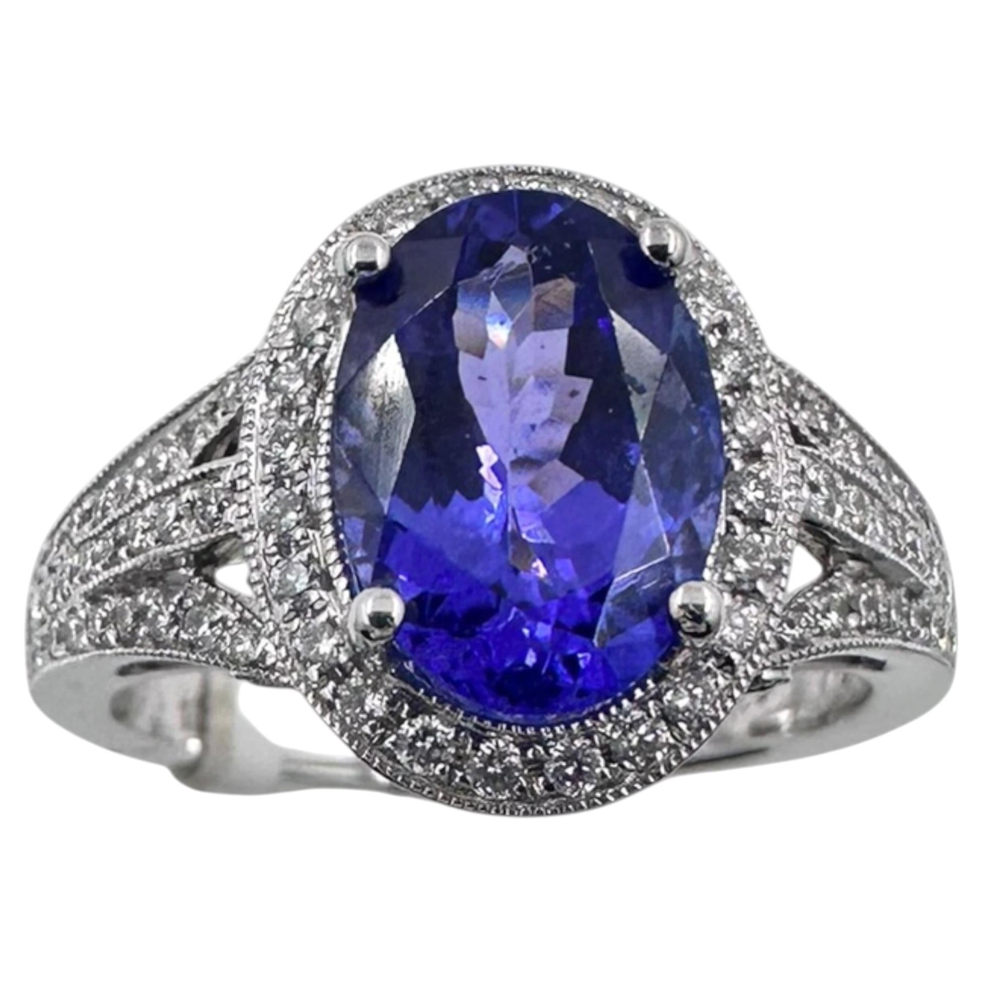 18K White Gold Ring with 5.00Ct. Tanzanite and Diamonds 0.70 Ct. (Size 6.50)