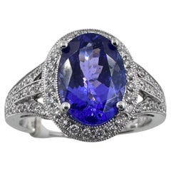 Bague en or blanc 18K avec 5.00Ct. Tanzanite et diamants 0,70 ct. (Taille 6.50)