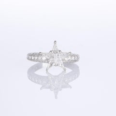 18K White Gold Ring with Diamond Star Centerpiece and Pave Diamonds