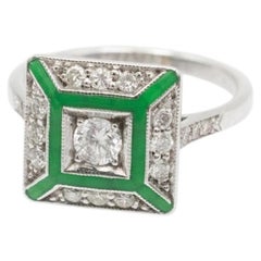 18k White gold ring with diamonds and green enamel.