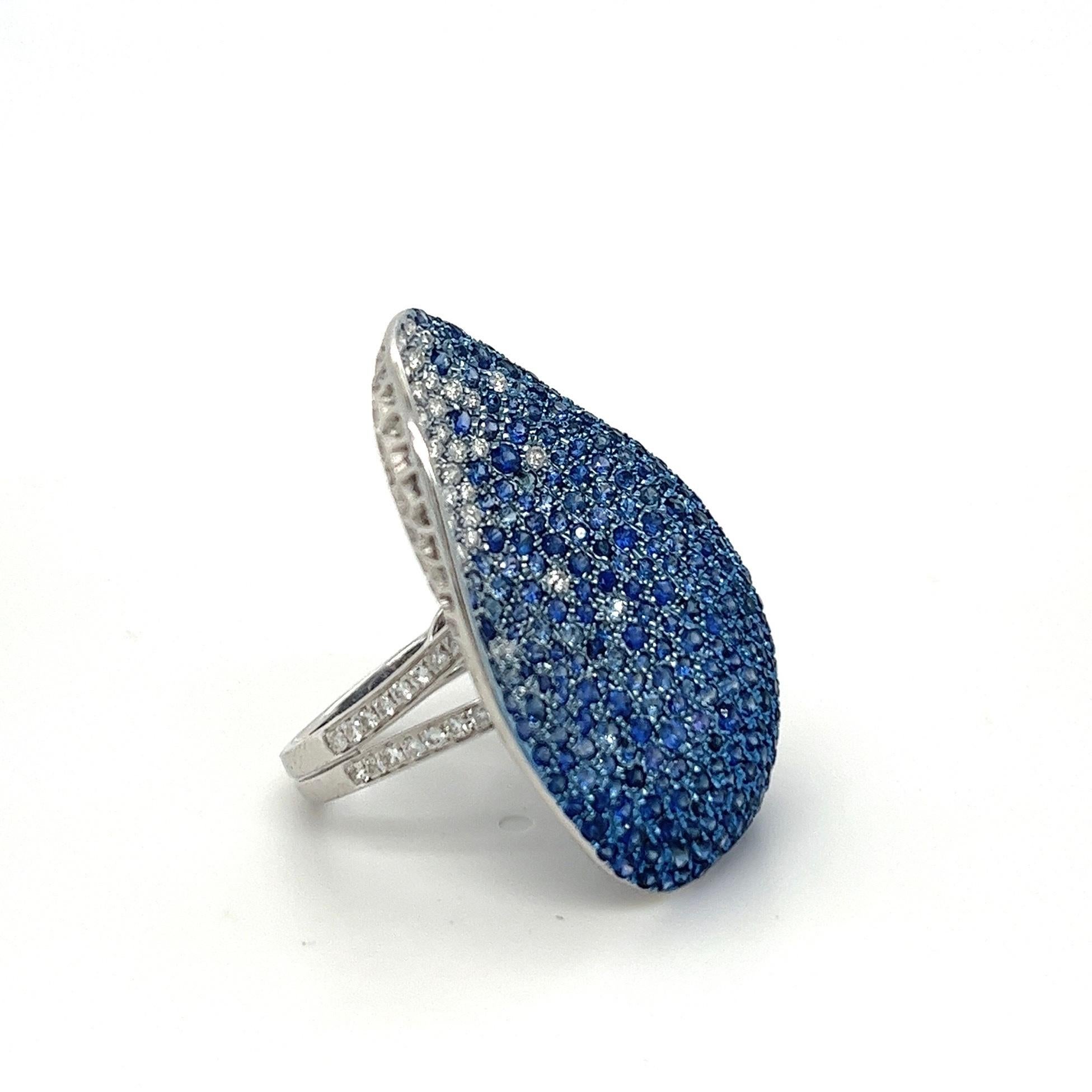 18K White Gold Ring with Diamonds & Blue Sapphires

340 Blue Sapphires - 4.08 CT
105 Diamonds - 0.92 CT
18K White - 8.86 CT

Introducing the Althoff Jewelry ring, a mesmerizing blend of blue sapphire and diamond, capturing the essence of leaves