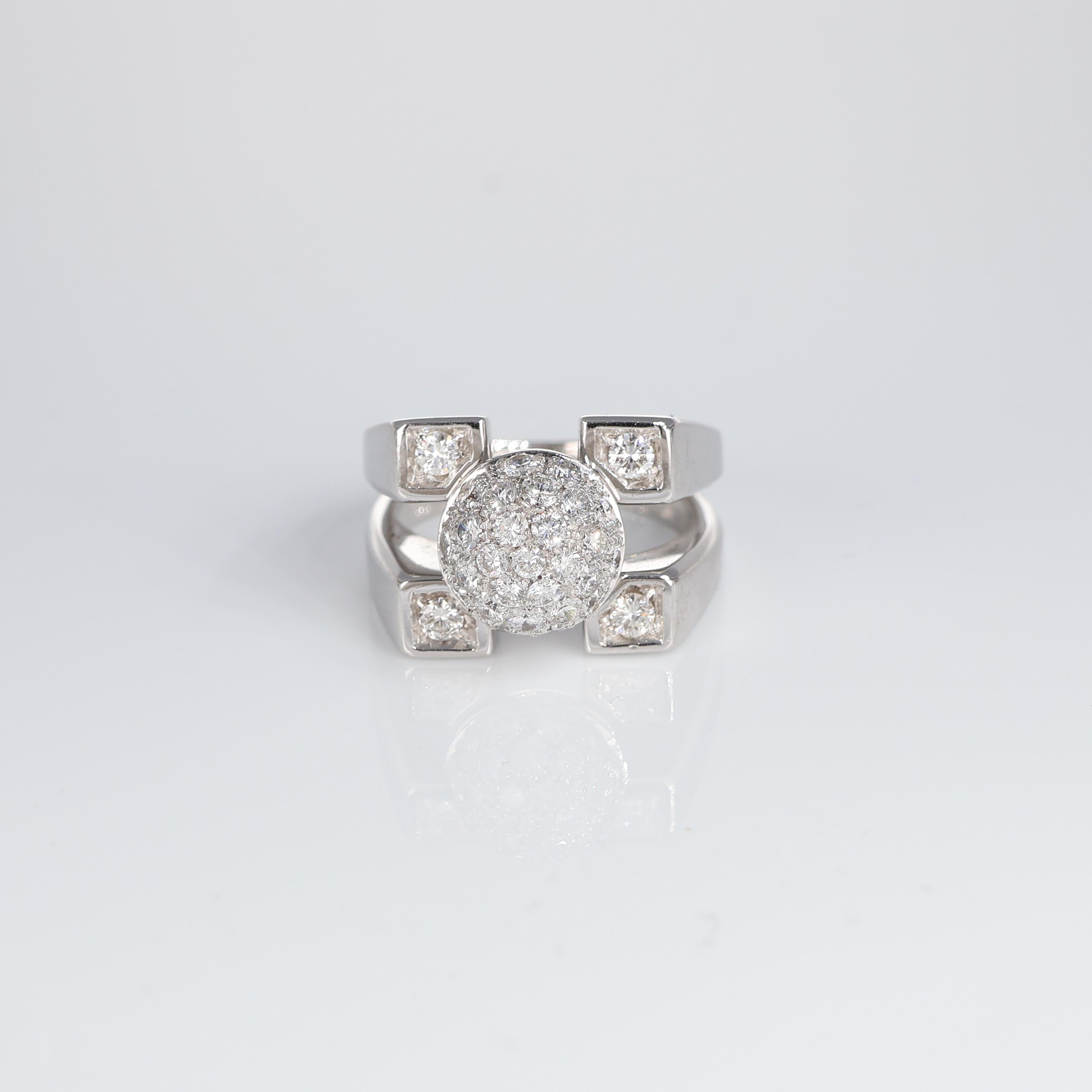A stunning display of modern elegance, this 18k white gold ring features a captivating sphere design adorned with a pavé of natural white diamonds, totaling 2.19 carats. The architectural style is enhanced by additional diamond accents, offering a