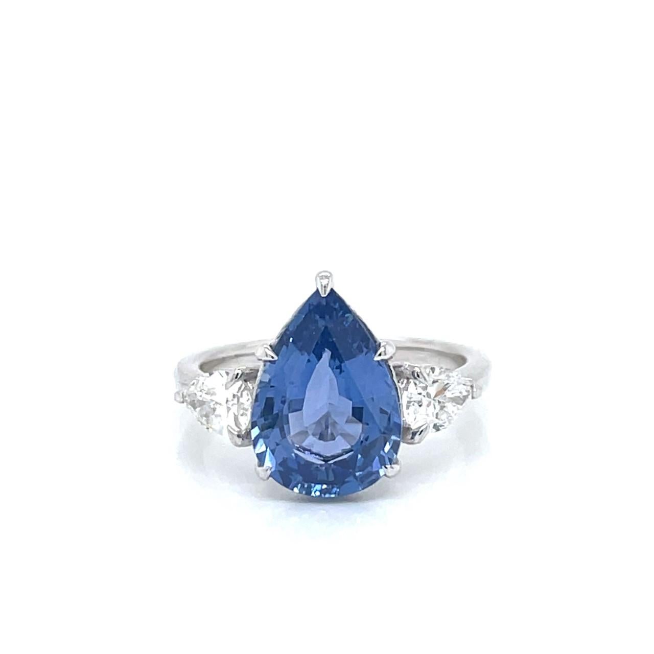 18k White Gold Ring with One 4.18ct Pear Sapphire and 0.80tcw Pear Diamonds In Excellent Condition For Sale In Newport Beach, CA