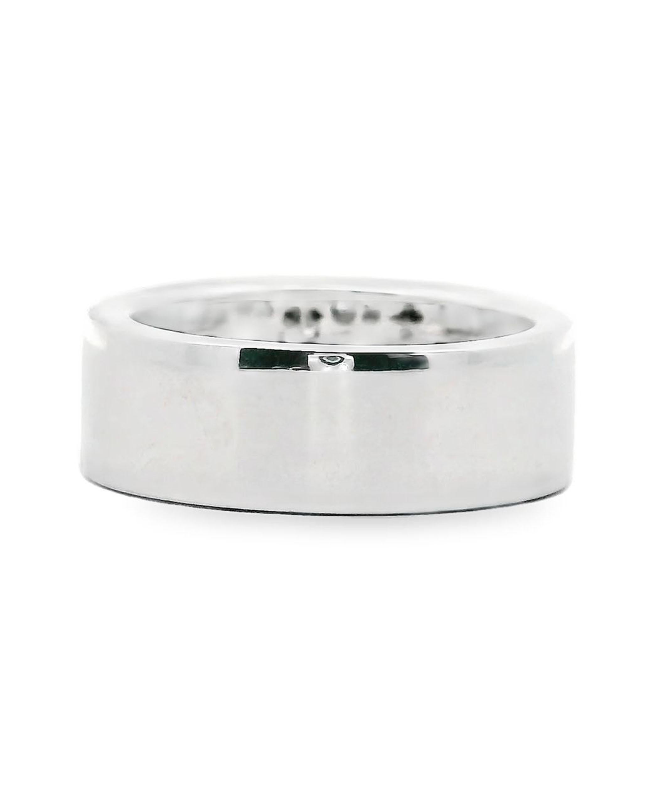 18K white gold ring with four princess cut diamonds weighing approximately 1.20 carats and 49 round brilliant cut diamonds weighing 0.50 carats. 

*Size 6.5 
*Width- 8mm Wide tapers down to 6.7mm wide
*G/H color, VS2/SI1 clarity