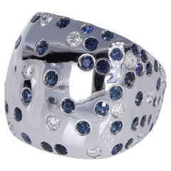 Anello in oro bianco 18 carati con zaffiro e diamante a forma di pois