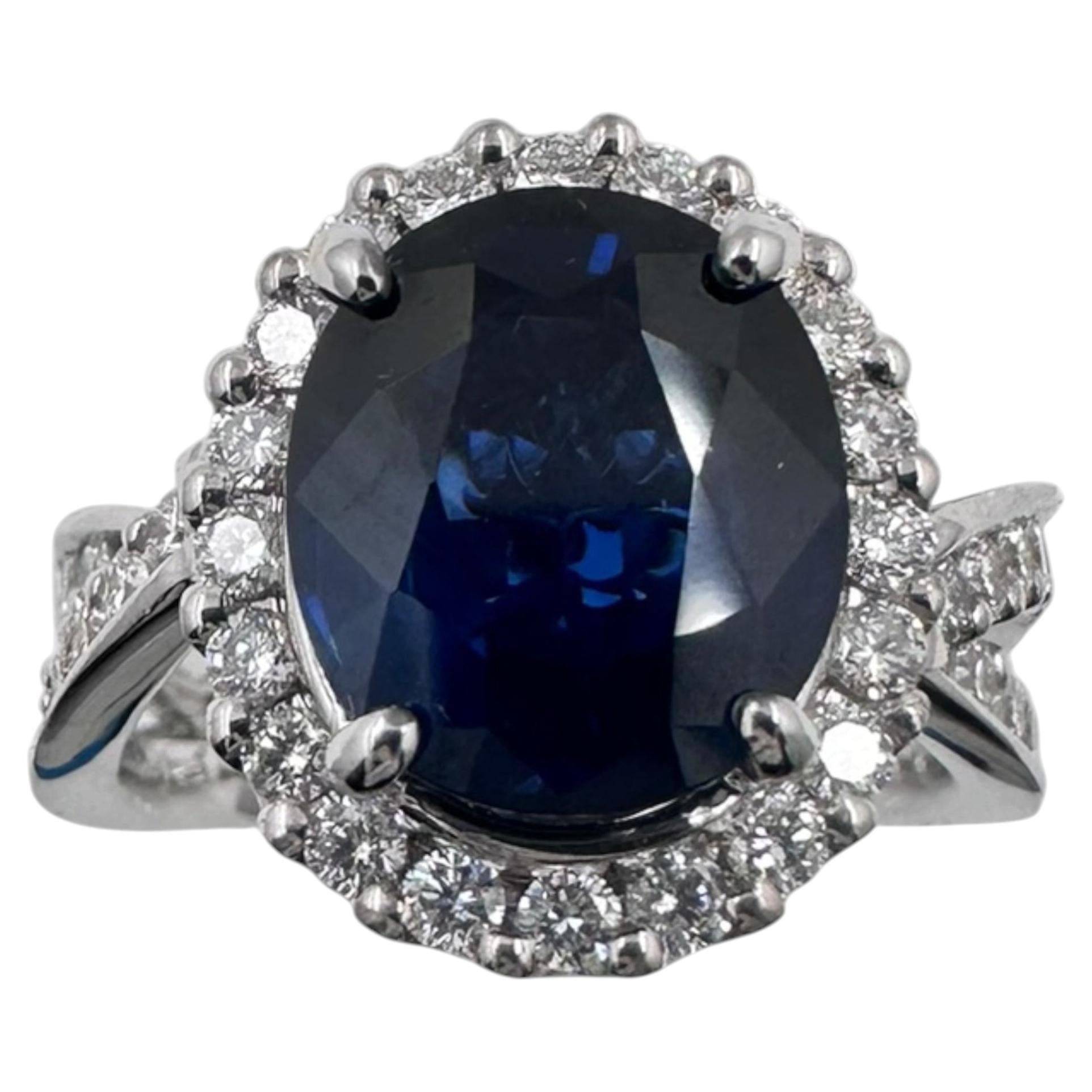 18K White Gold Ring with Sapphire and Diamonds 0.83 Ct. (Size 6.00)