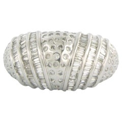 18k white gold ring with taper and brilliant cut diamonds. 1.00ct 7.4 grams