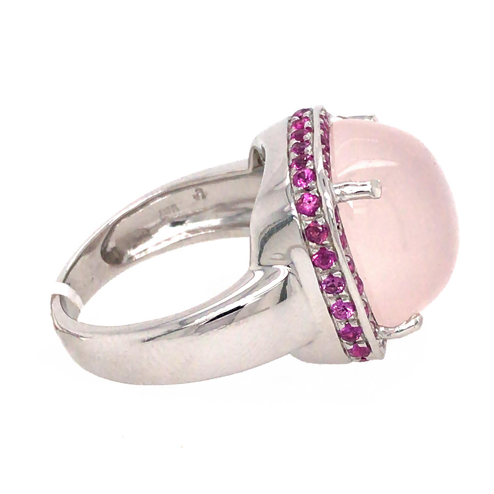 18k White Gold
Rose Quartz: 11.50 tcw
Pink Sapphire: 0.80 tcw
Ring Size: 7.75
Total Weight: 12.1 grams