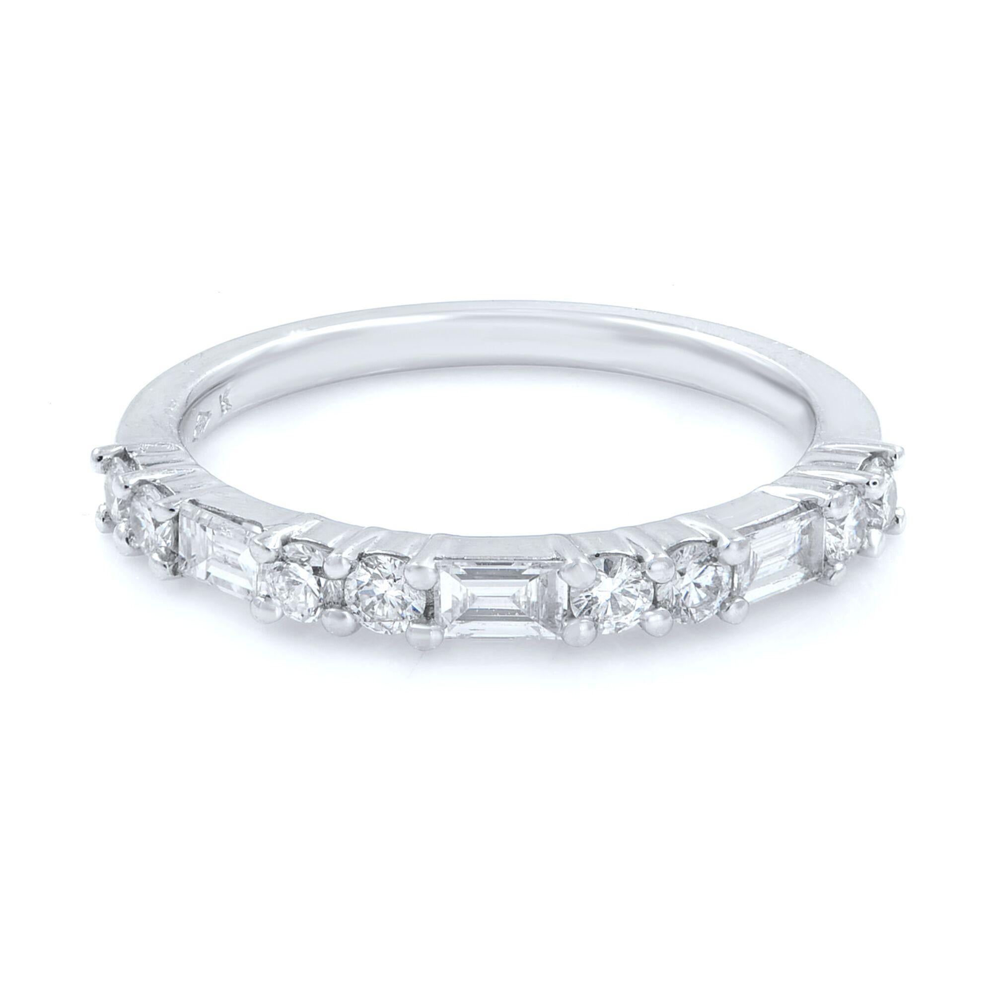 Alternating sections of two round brilliant cut diamonds and one baguette cut diamond continuing half way around in a 18 karat white gold prong setting wedding band. 
Carat weight: 0.58cts
Size: 7