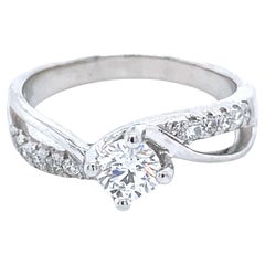 18k White Gold Round Brilliant Diamond Cts 0.4 Twisted Engagement Ring