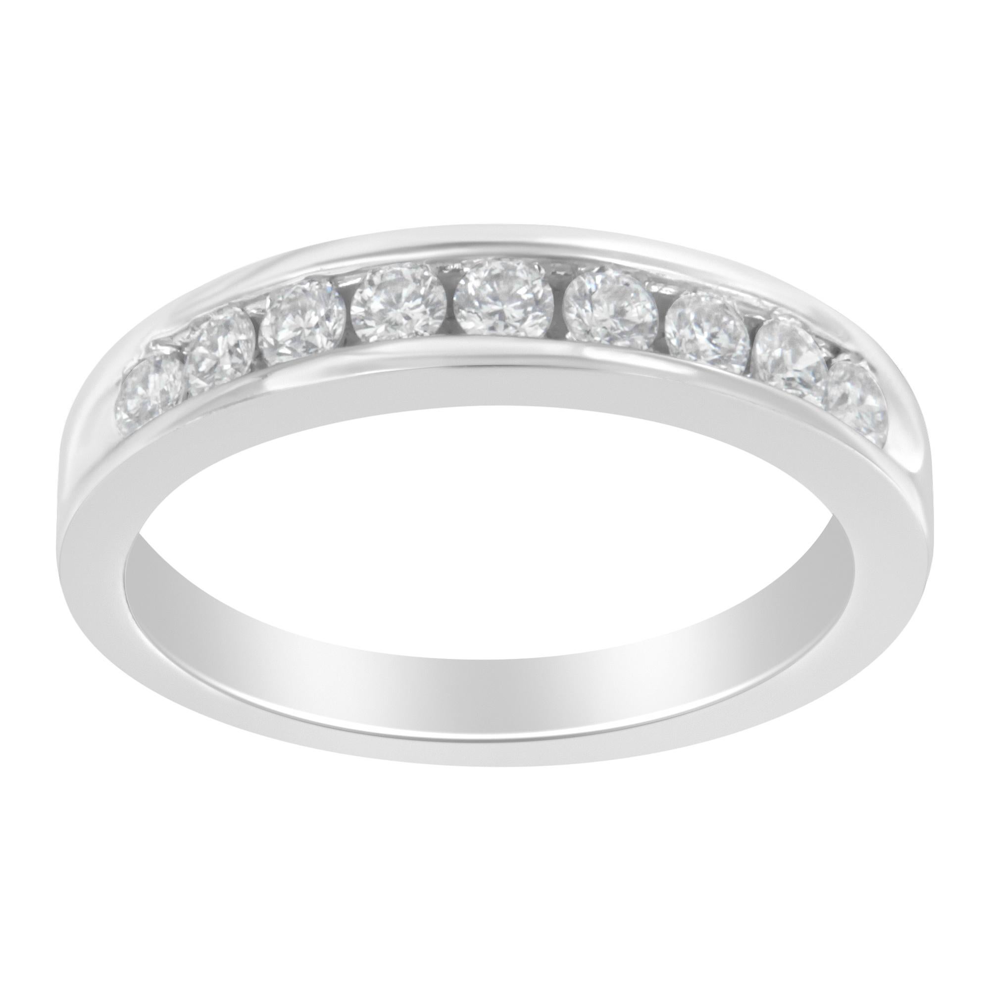 Represent an eternity of love for her by presenting her this charming ring band. This dazzling band is elegantly composed of rich 18 karat white gold. Moreover, the ornamentation with sparkling round cut diamonds in a channel setting makes it look