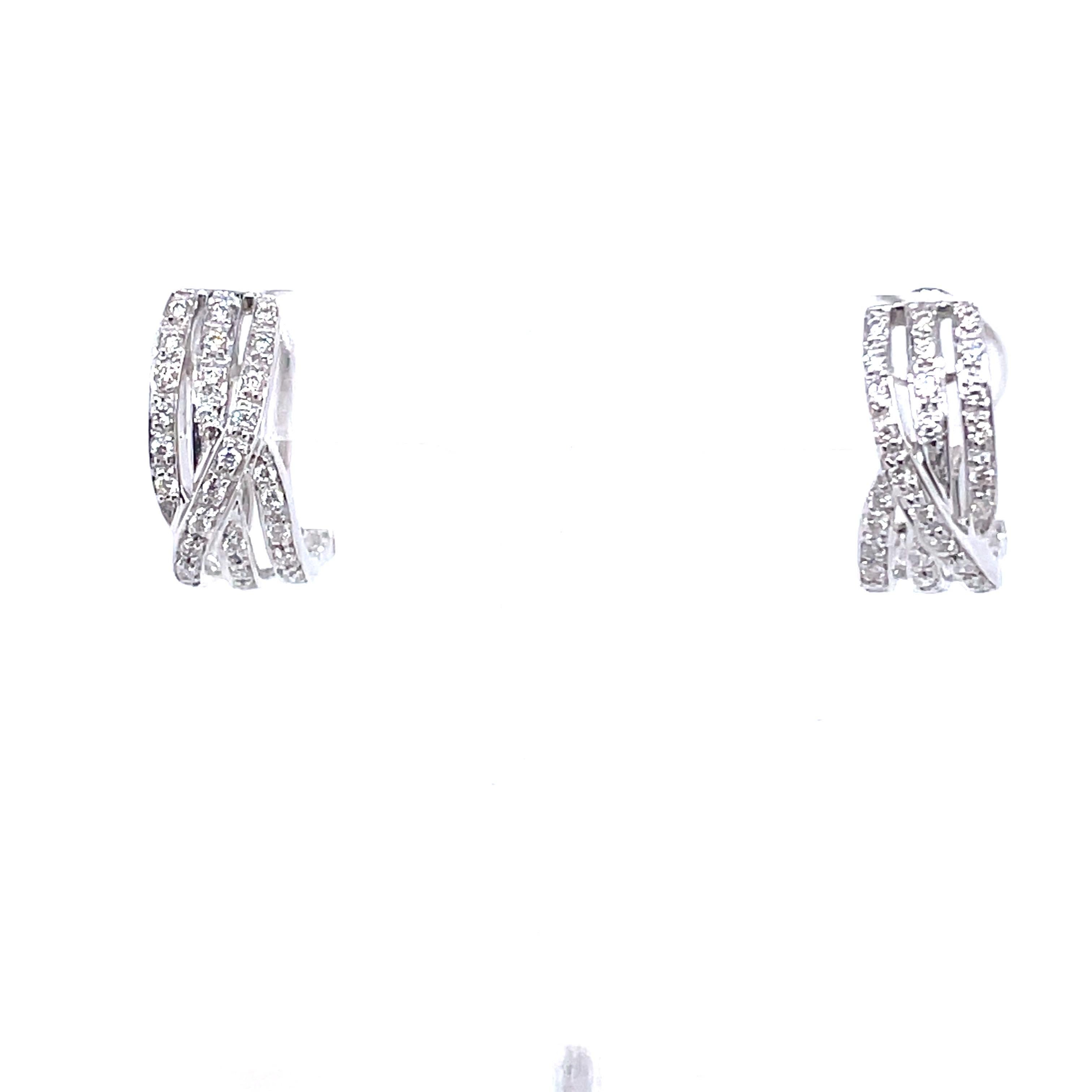 Crafted with a mesmerizing dance of curved lines, these earrings boast a total of 0.38 carats of dazzling round diamonds, set in 18k white gold weighing 4.72 grams.

Whether you're wearing these 18k white gold earrings for a formal evening event or