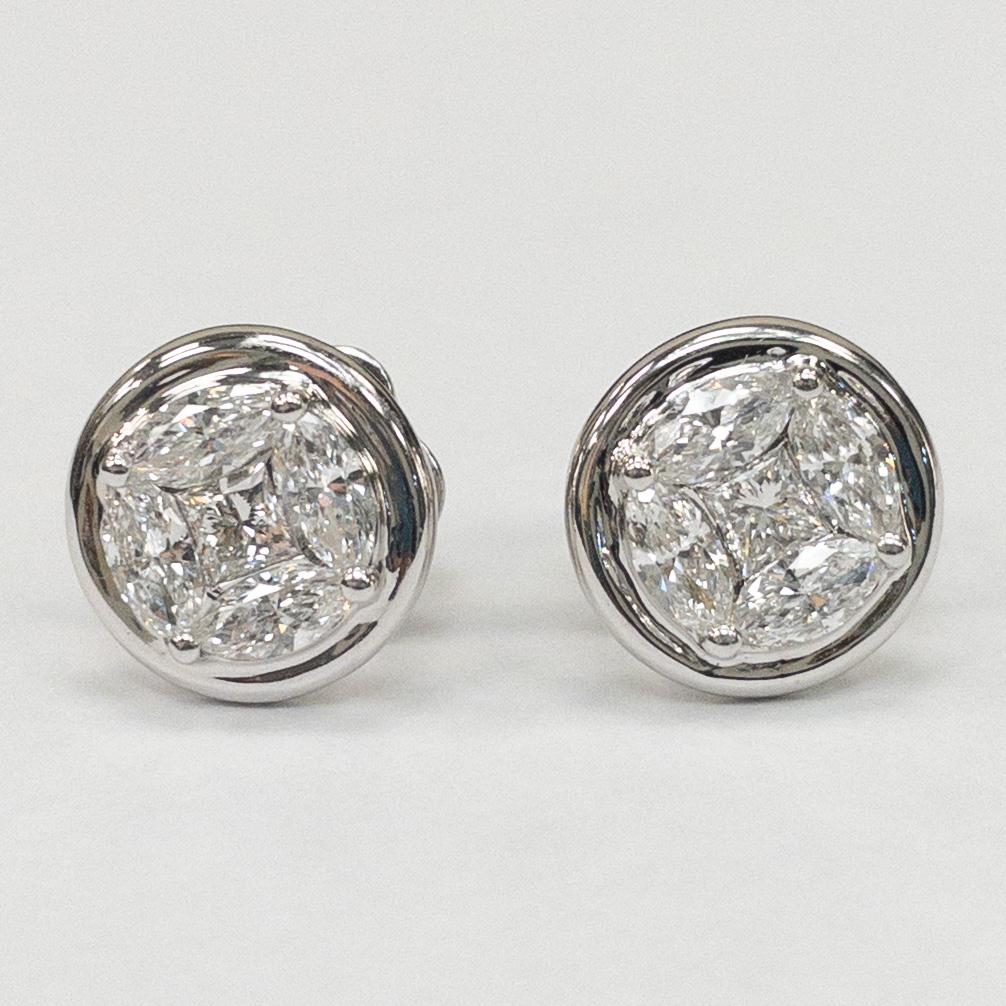 Carefully handcrafted, delicately cut and effortlessly elegant. This earring using the prong and pave setting, features 2 pieces princess-cut diamonds, weighing 0.48 carats, 8 pieces marquise diamonds, weighing 1.64 carats. Made in 18K white gold.