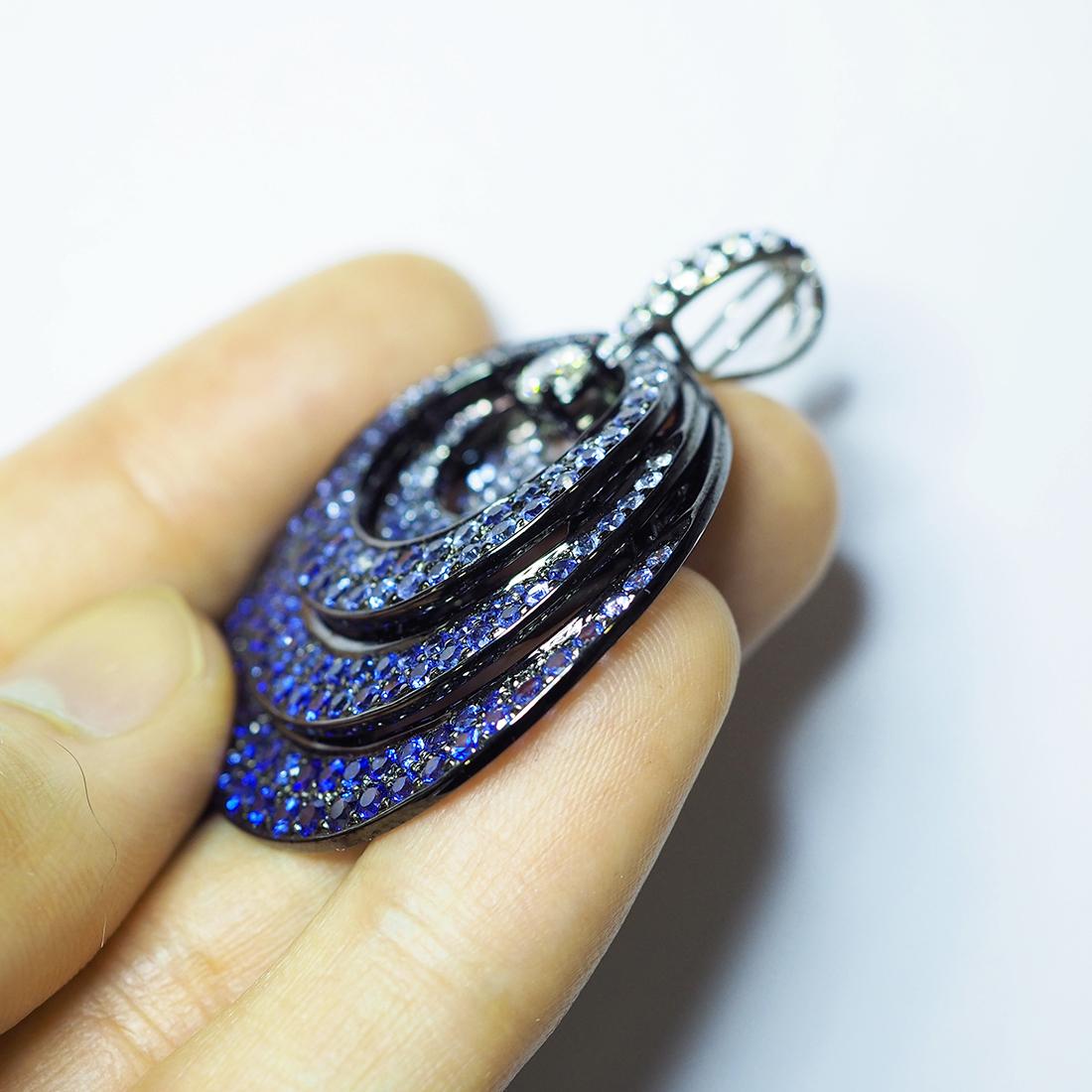 18K White Gold Round Sapphire and Diamond Pendant Necklace

We design a very nice pendant .It has 3 layer and we graduated color on it .For making it looks soft and sweet.The sapphire is top quality .It is deep blue and very sparking. Sapphire use