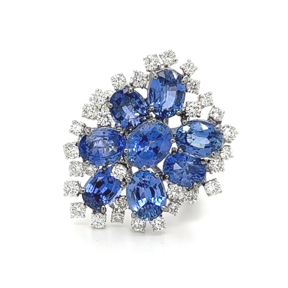 18K White Gold Royal Blue Sapphire Ring with Diamonds

8 Blue Sapphires - 9.33 CT
57 Diamonds - 1.65 CT
18K White Gold - 7.25 GM

The 18K white gold ring features a striking royal blue sapphire as its centrepiece, its deep, saturated hue captivating