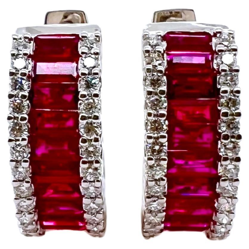 These gorgeous ruby hoop earrings are set in 18k white gold with round brilliant diamonds on the shoulders.  The ruby stand out against the white gold and are perfect for the smart casual look!


Stone: Ruby 2.03 cts, Baguette
Diamonds: 0.45, Round