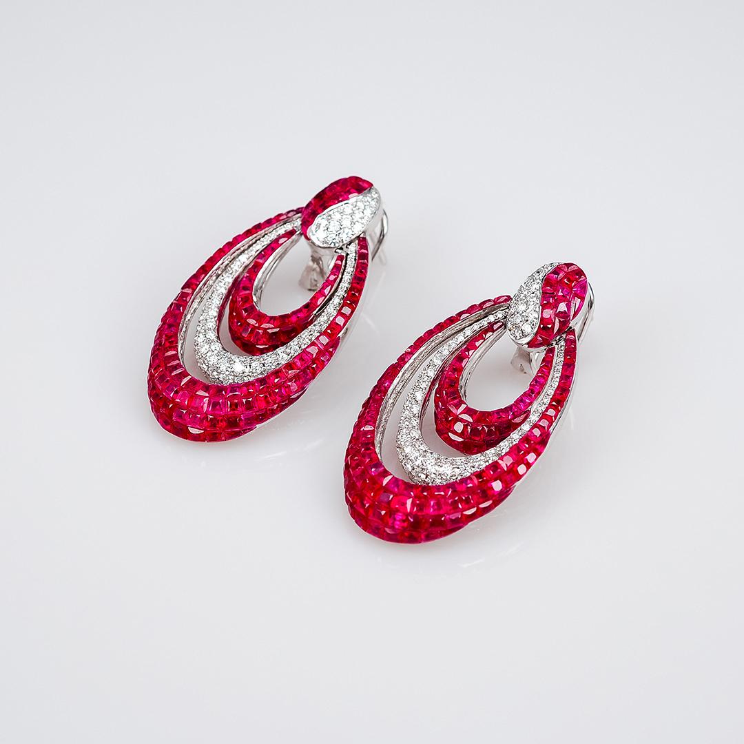 Ruby hoop earrings is very nice modern style that you can use for the evening party .We design for all 3 layers that can move all layers.It look soft and smooth.We use the top quality Ruby which make in invisible setting.We set the stone in