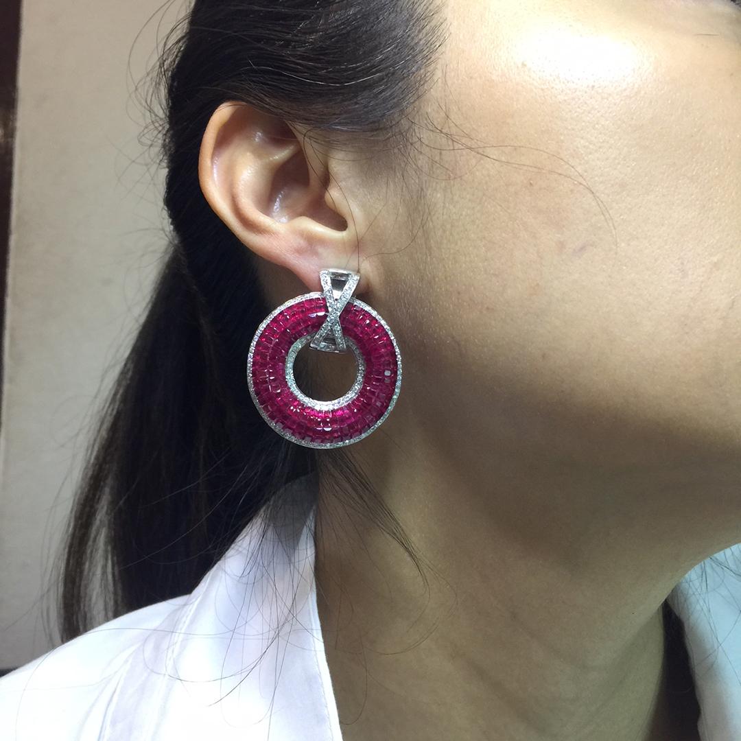 18 Karat White Gold Ruby and Diamond Invisible Hoop Earrings

Ruby hoop earrings design as luxury elegant .It is suitable for evening dress and party.It look big and gorgeous. We use the top quality Ruby which make in invisible setting.We set the
