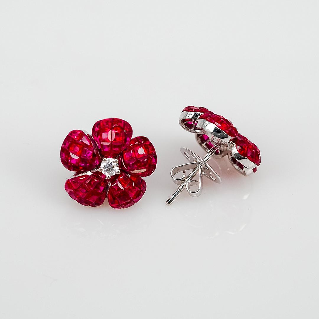 A lovely ruby stud earrings that you can use as everyday.We use the top quality Ruby for our invisible setting.It is deep red and very sparking. The invisible is a highly technique .We set the stone in perfection as we are professional in this kind