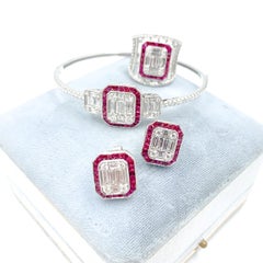 18 Karat White Gold Ruby and Diamond Suite 'Ring, Earrings, Bangle'
