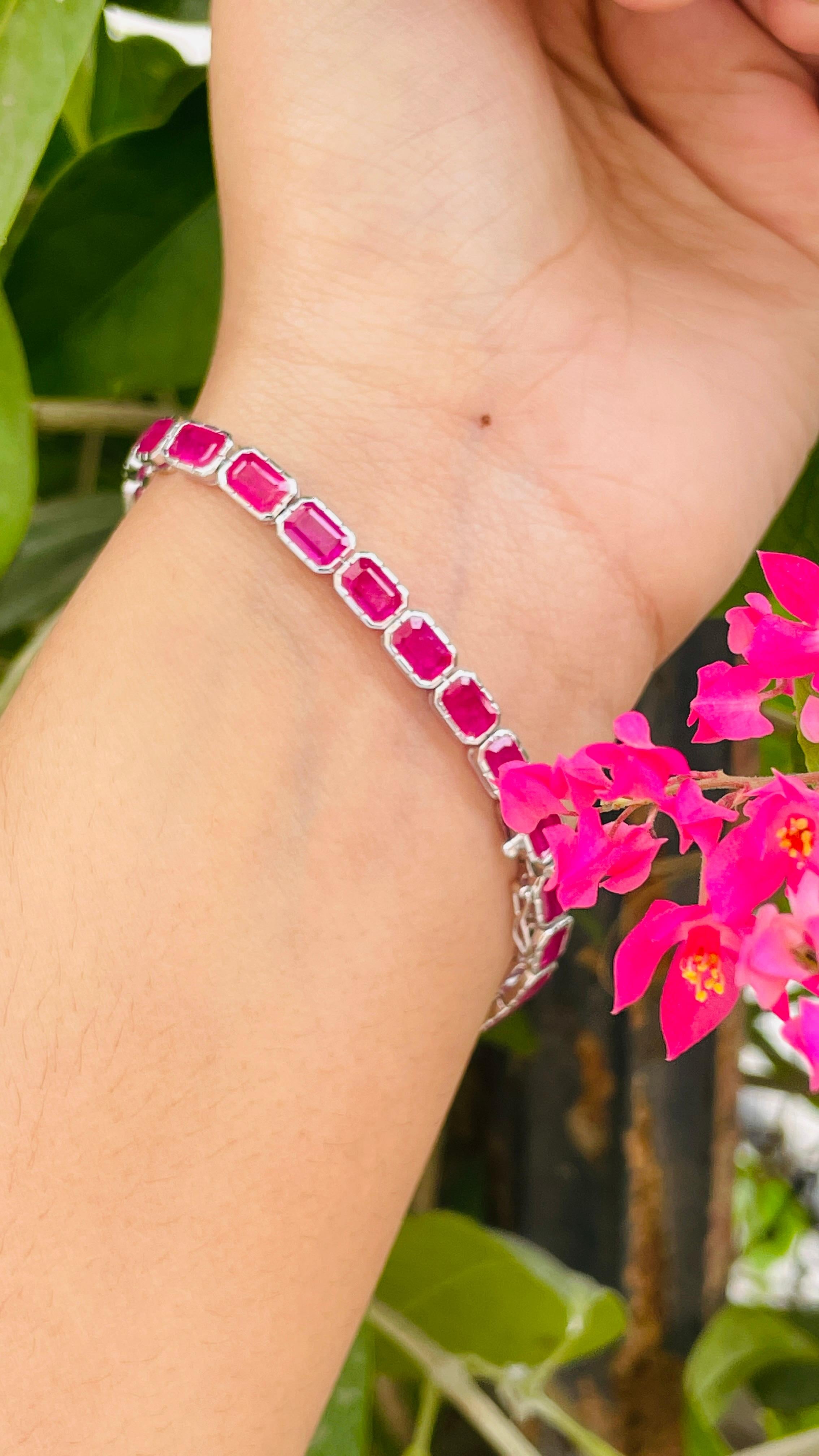 This Ruby Octagon Tennis Bracelet in 18K gold showcases 15.5 carats of endlessly sparkling natural ruby. It measures 7.5 inches long in length. 
Ruby improves mental strength.
Designed with octagon cut ruby solid gold settings to make you stand out