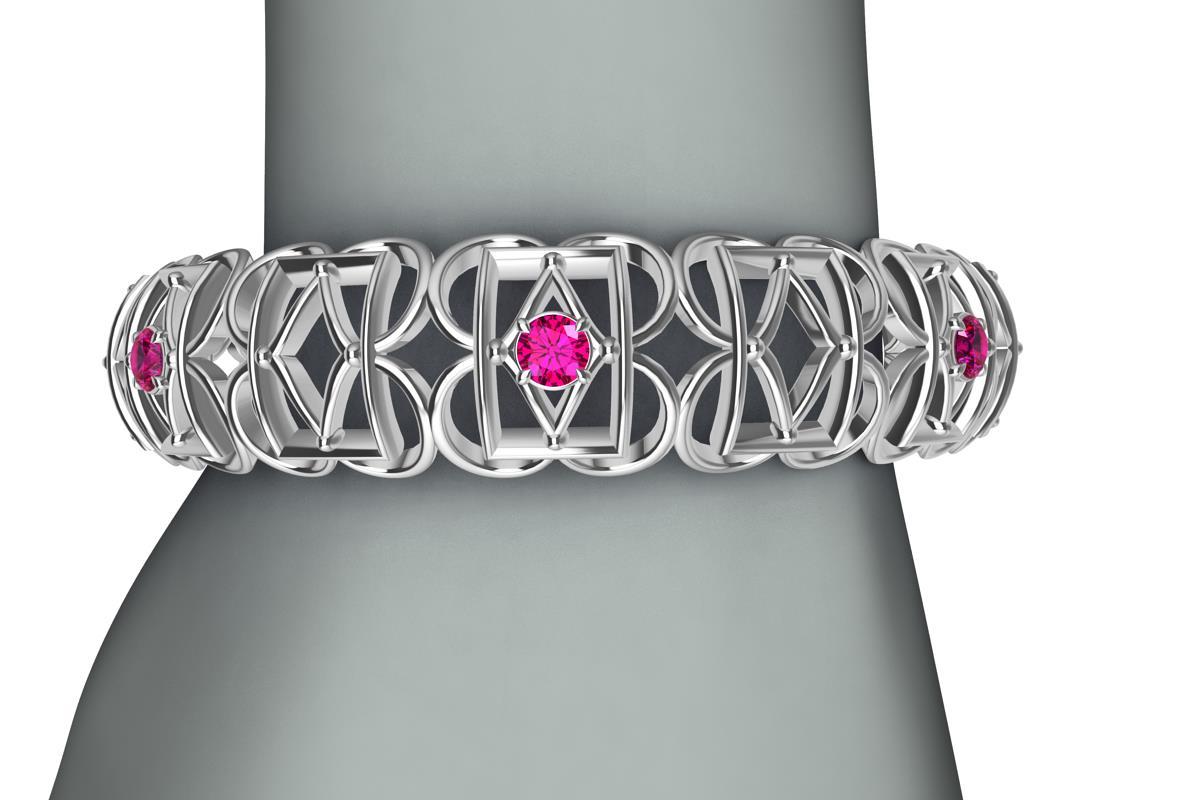 18k White Gold Ruby Rectangle and Rhombus Bangle, from the Gates series. This bracelet is inspired from hand wrought ironwork off balconies, windows, and gates in Europe. A modern twist with 7 rubies,  2.66 carats of diamond cut rubies for more