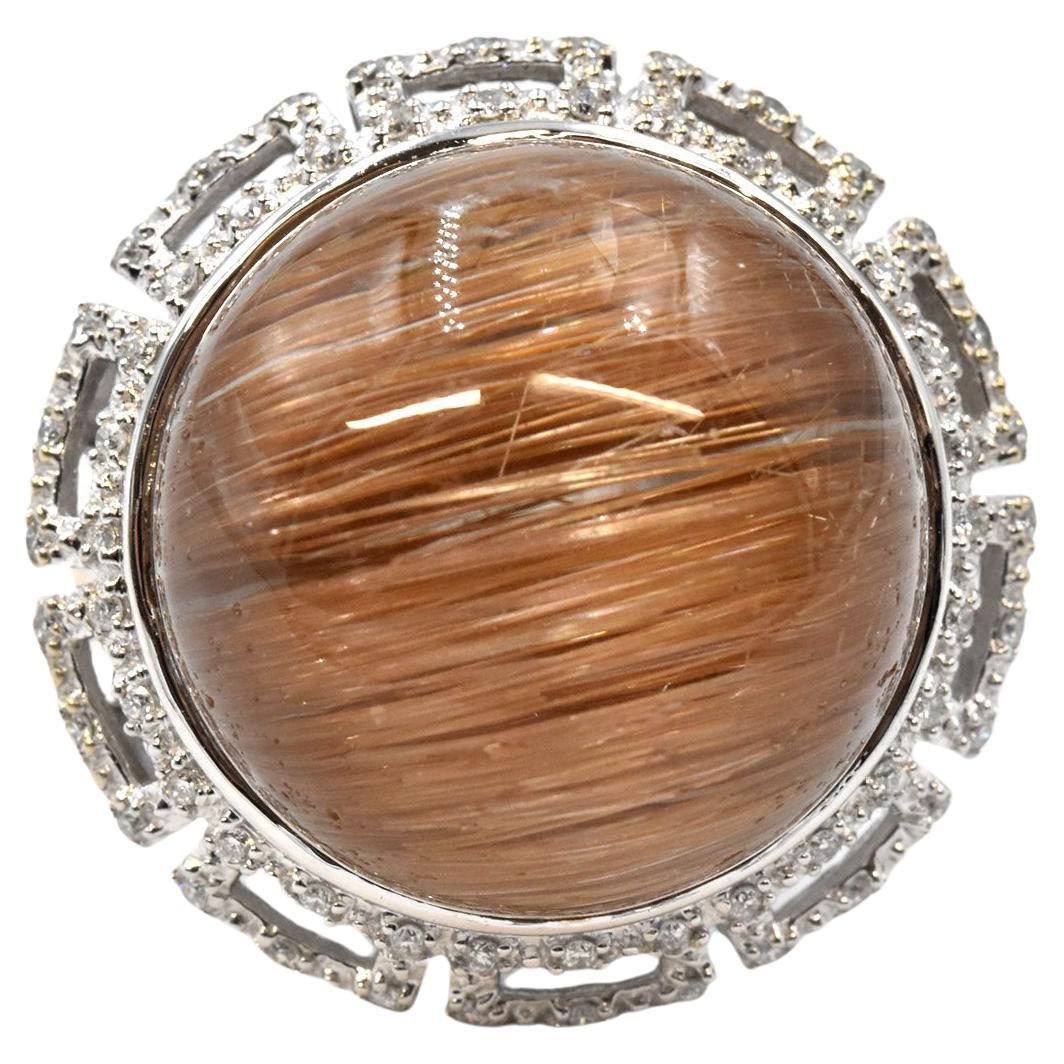 Bague en or blanc 18 carats, quartz rutile et diamants