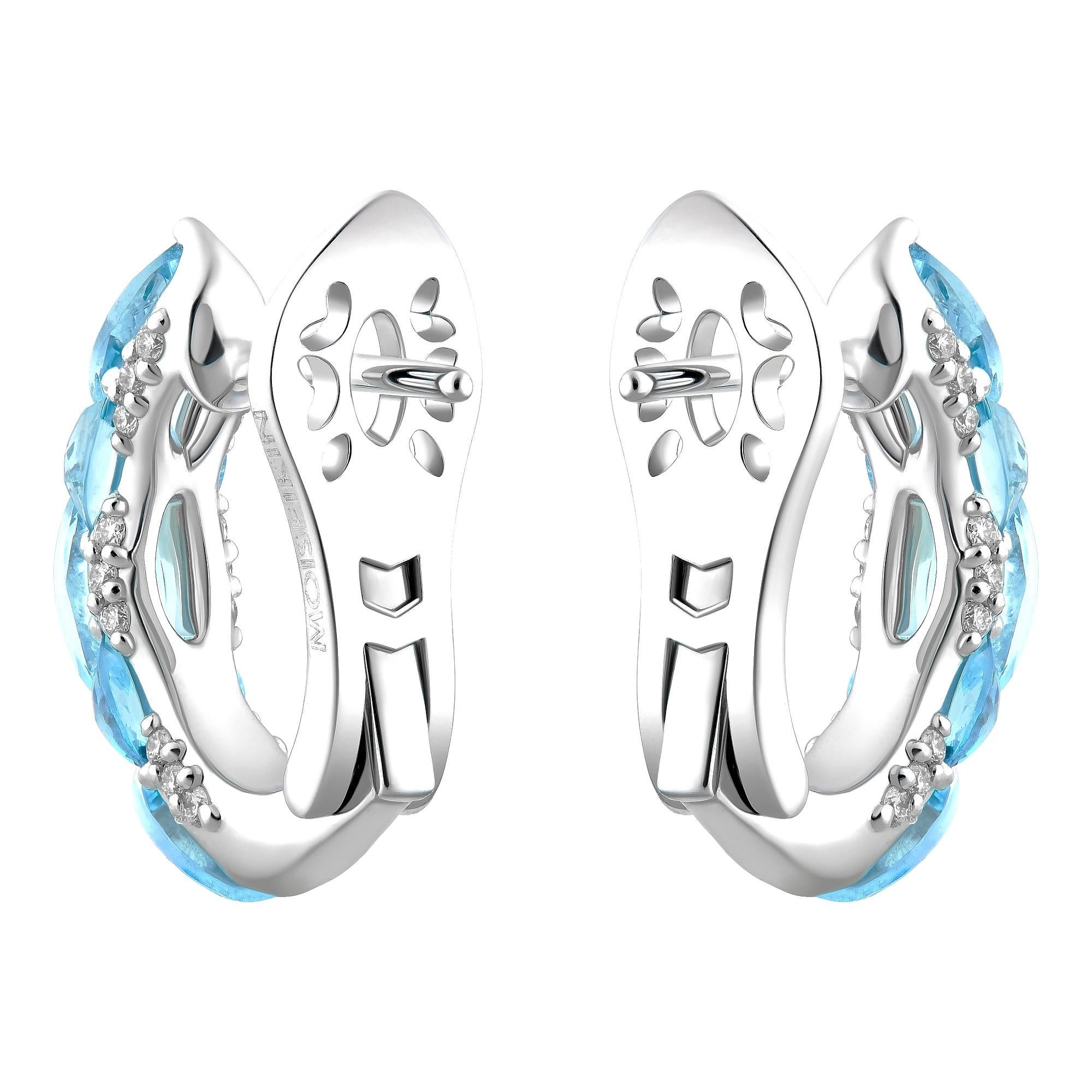 The exquisite elegant earrings from the MOISEIKIN's Harmony of Water collection is made of Santa Maria Aquamarines and shimmering diamonds.
The lightful harmony of aquamarines mounted in traditional and unique reverse settings creates intensive