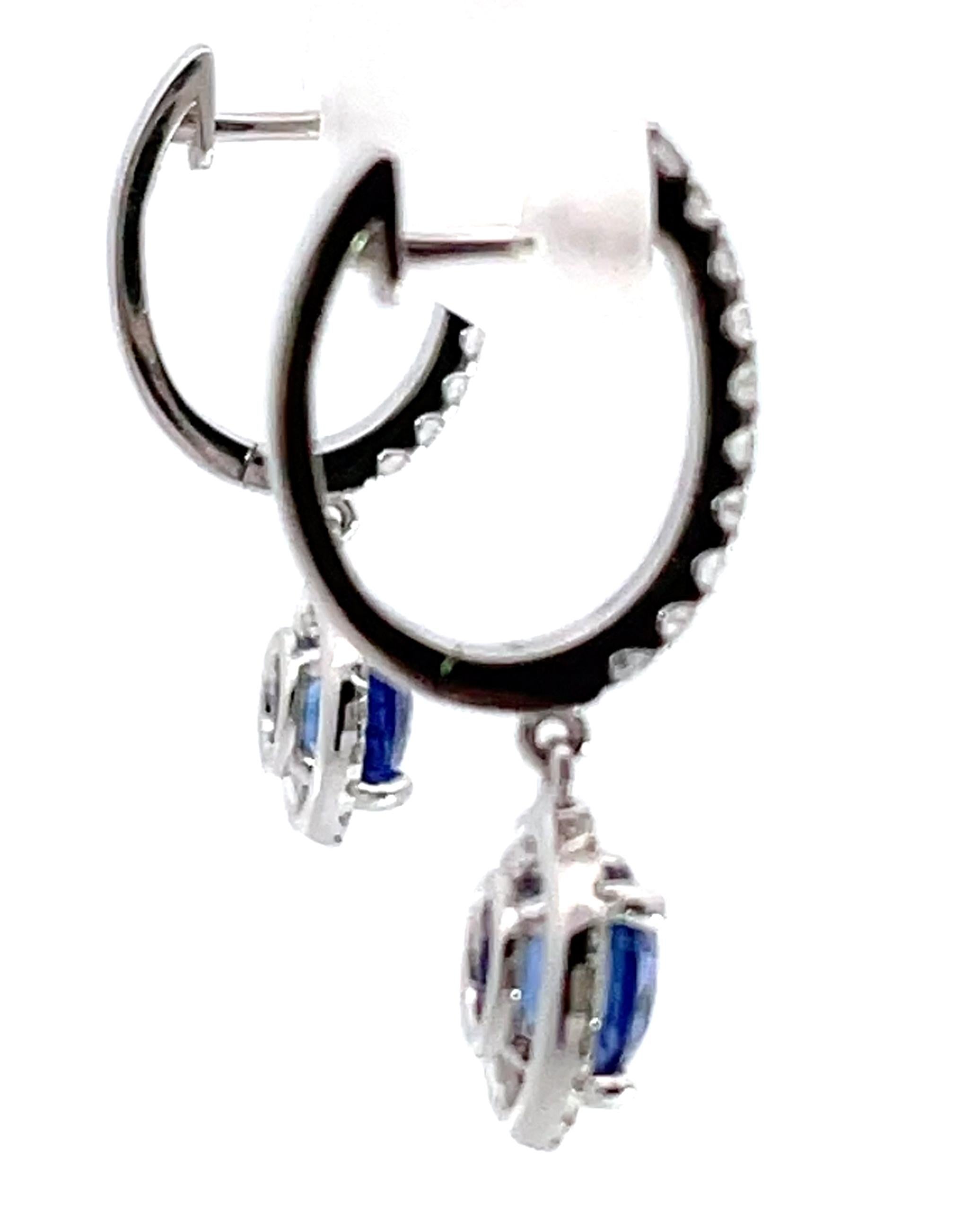 Contemporary 18K White Gold Sapphire and Diamond Drop Halo Earrings For Sale