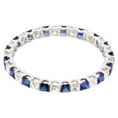 18k White Gold Sapphire and Diamond Princess Cut Eternity Engagement Ring
