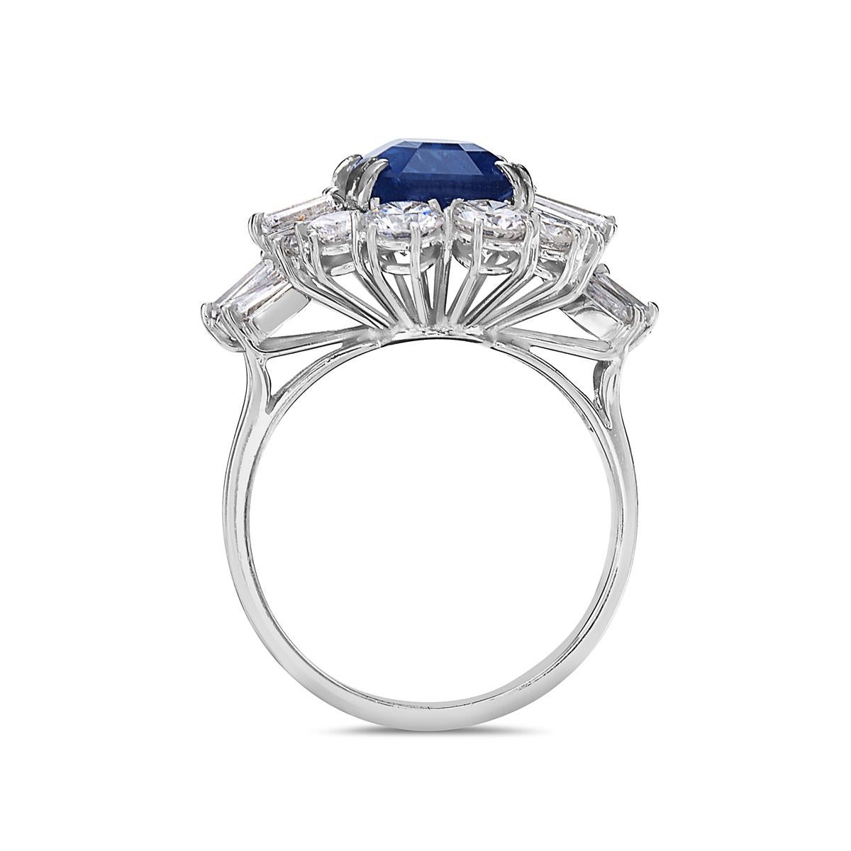 This ring features a 5.83 carat sapphire and 8 round diamonds, 14 baguettes weighing 3.60 carats set in white gold. Made in Italy. Size 7.5.

Resizeable upon request.

Viewings available in our NYC showroom by appointment.
 