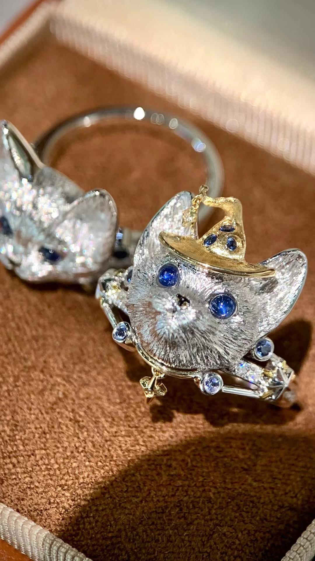 18K White Gold Sapphire & Diamond 'Cat' Collection Ring

Sapphire - 0.226 CT / Diamonds
18K Gold - 7.45 GM