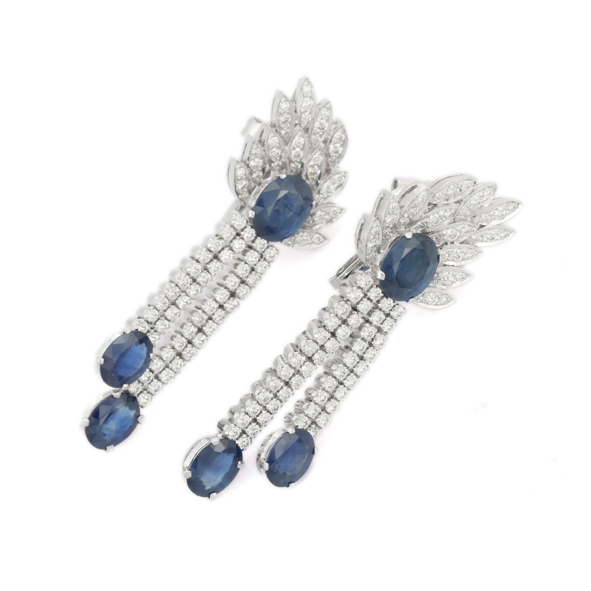 Sapphire Diamond Fine Earrings in 18K Gold to make a statement with your look. You shall need statement dangle earrings to make a statement with your look. These earrings create a sparkling, luxurious look featuring oval cut sapphire.
Sapphire