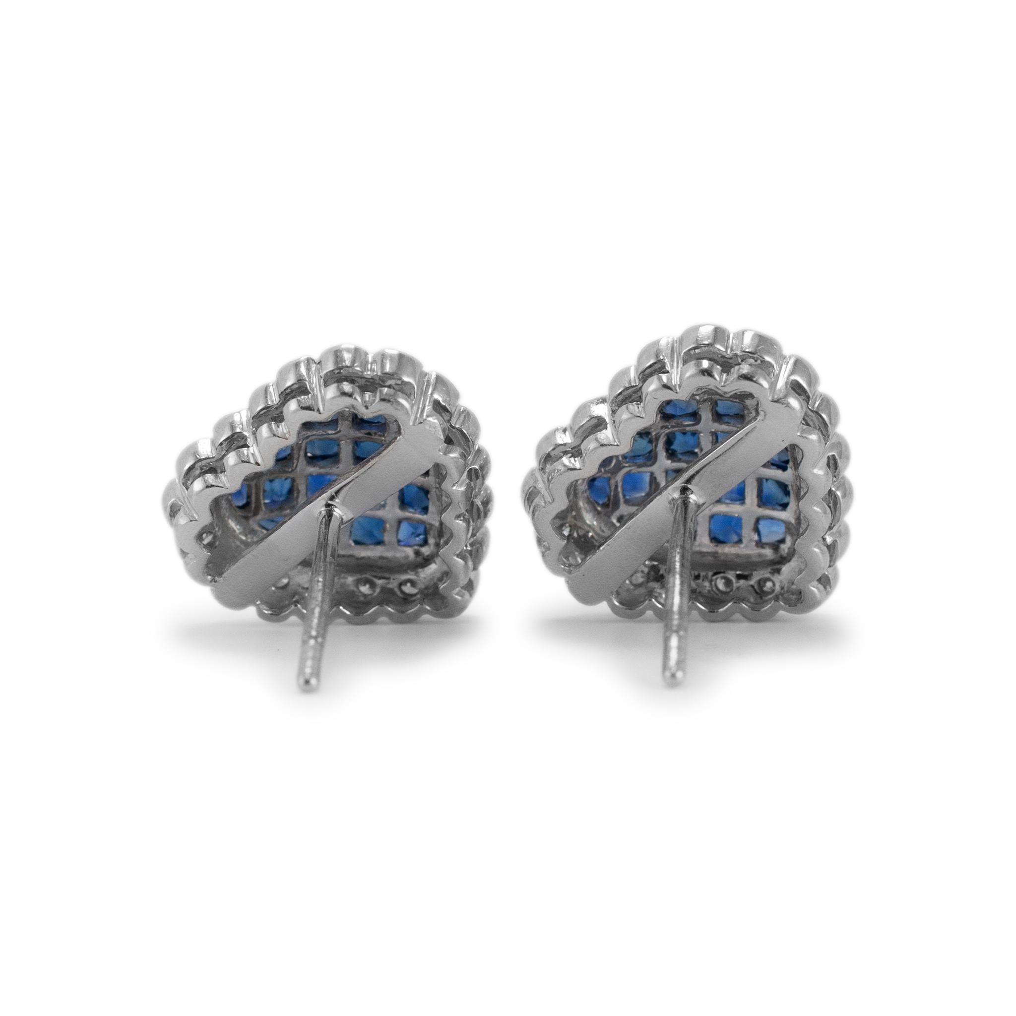 Gender: Ladies

Metal Type: 18K White Gold

Length: 0.50 inches

Weight: 6.29 grams

One pair of lady's Rhodium-plated 18K white gold diamond and sapphire stud earrings with push-backs, Engraved with 