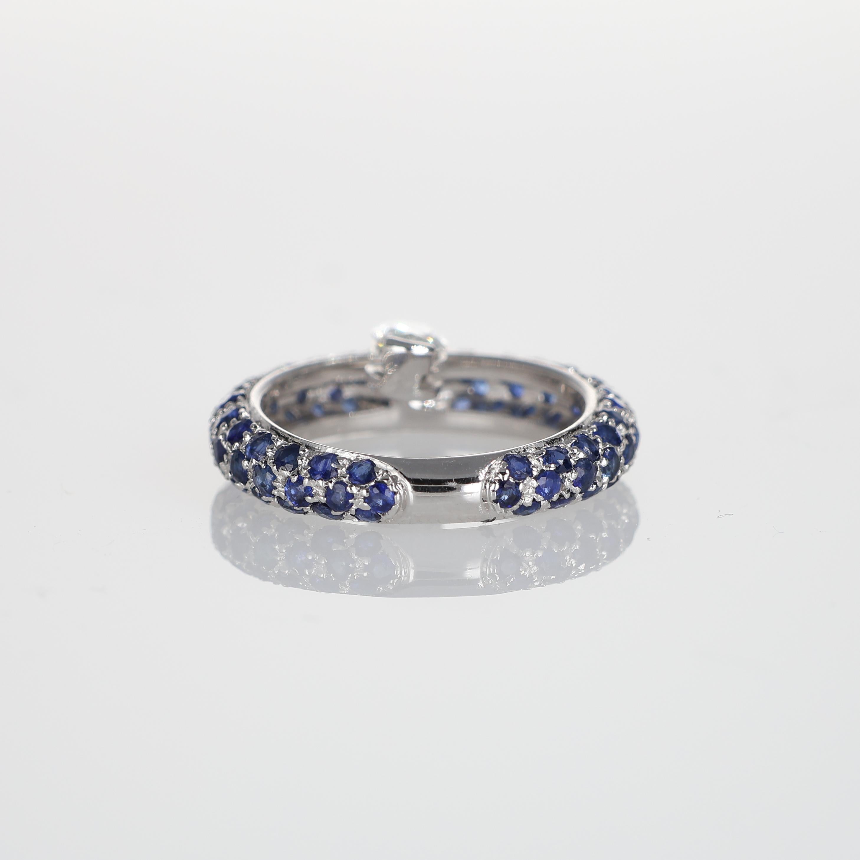 Women's or Men's 18K White Gold Sapphire Pavé Ring with Suspended Oval Diamond For Sale