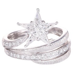 Anillo solitario satinado de oro blanco de 18 quilates con diseño de estrella fugaz