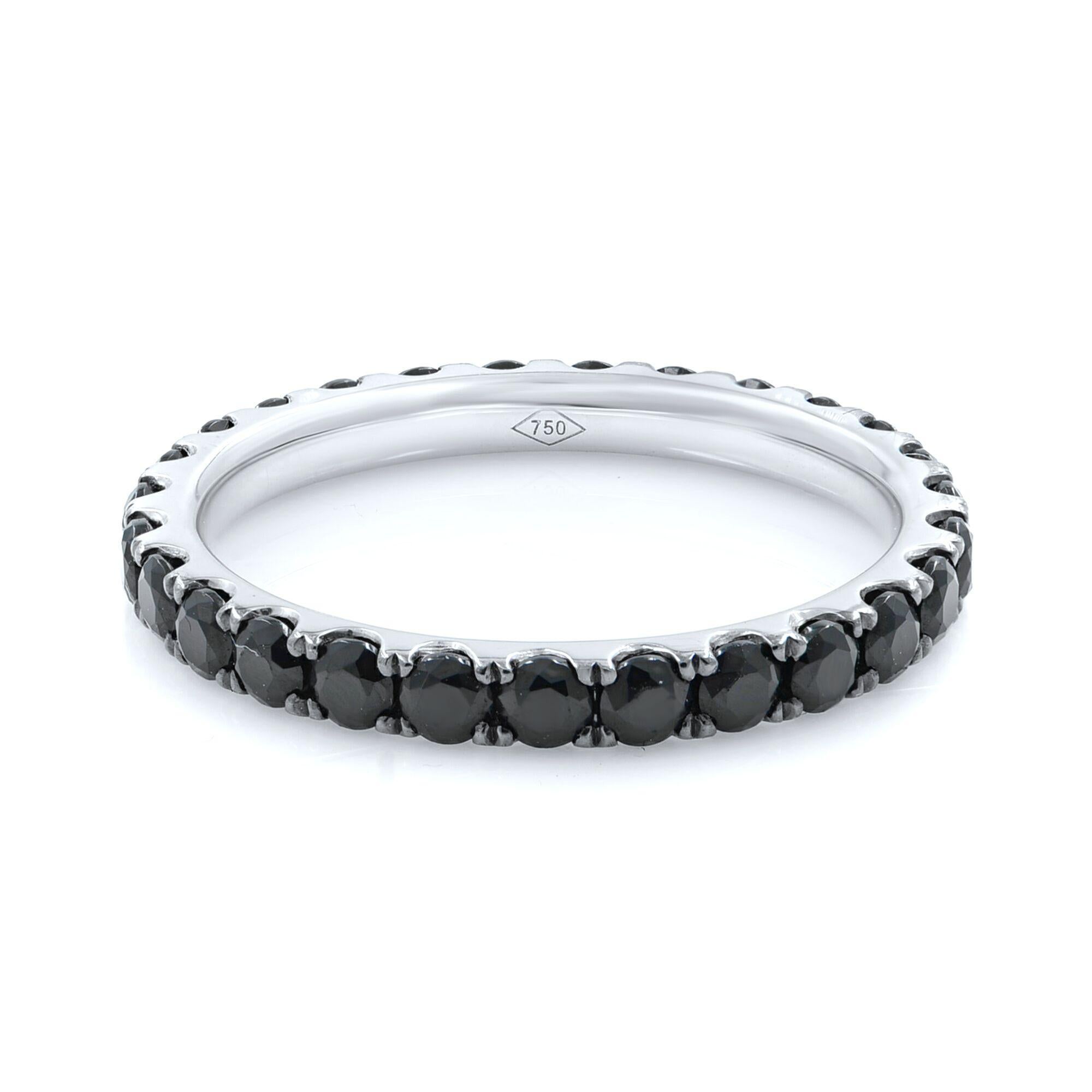 Brand New Dainty black diamond pave set eternity ring crafted in 18k white gold set with 1.37cts of natural black diamonds. 
Size: 5.75
Weight: 1.5 grams
