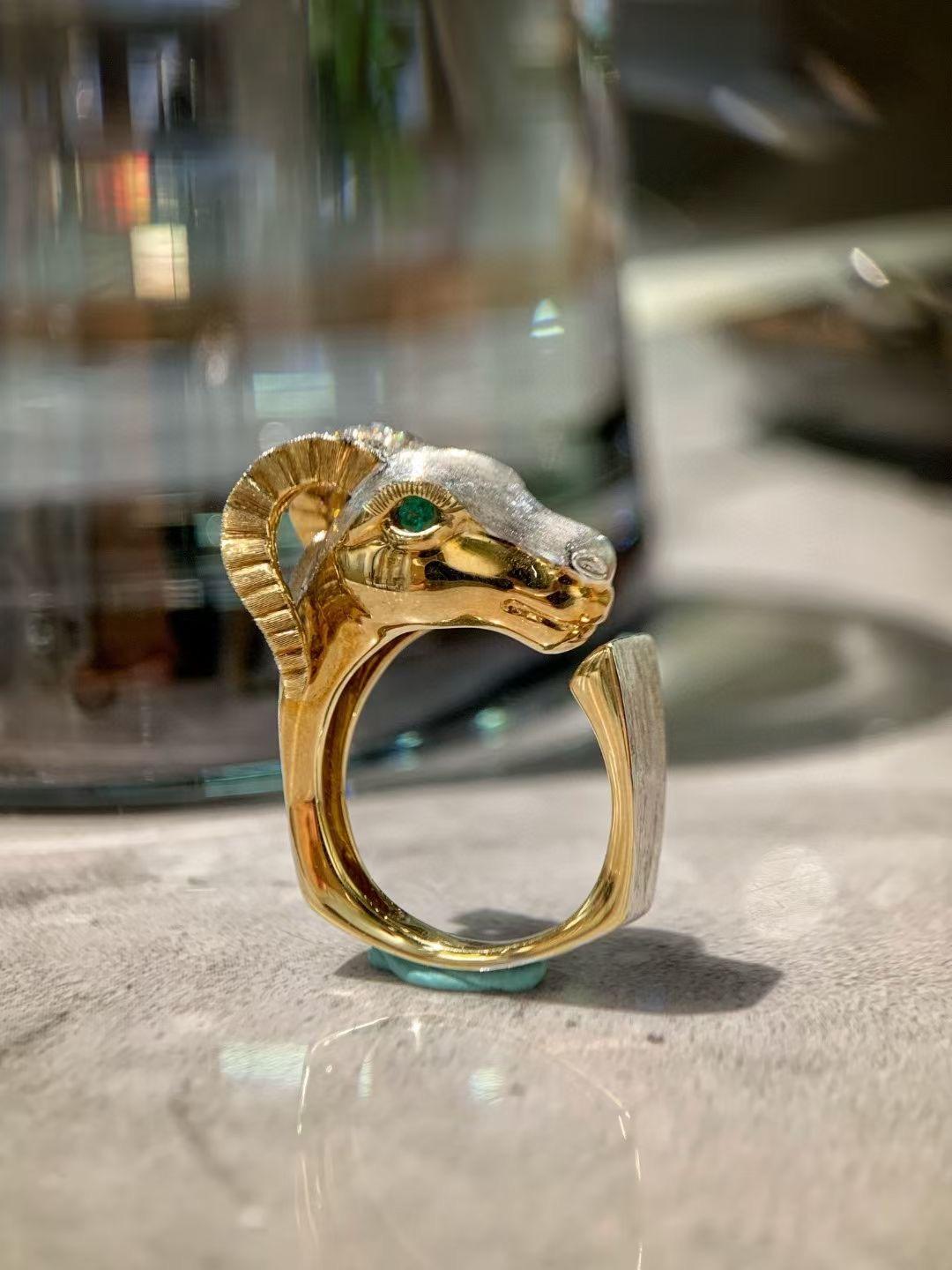 18K White Gold Sheep Head Gold Graving Ring with Diamonds

Emeralds - 0.071 CT
Diamonds - 0.10 CT
1 Natural Ruby

Total Weight - 10.53 GM