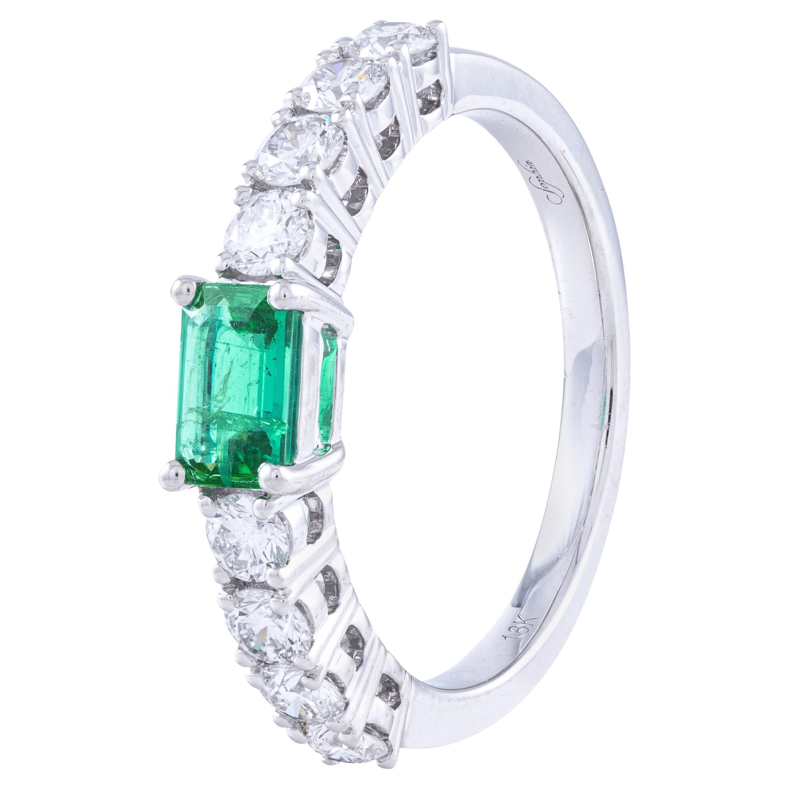 18K White Gold Single Row Diamond Ring with One Center Emerald 0.71 Ct East West For Sale