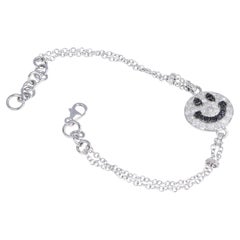 18K White Gold Smile Bracelet with Ice and Black Diamonds