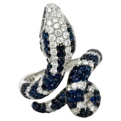 Anello Snake in oro bianco 18 carati con zaffiro blu e rubino e diamante
